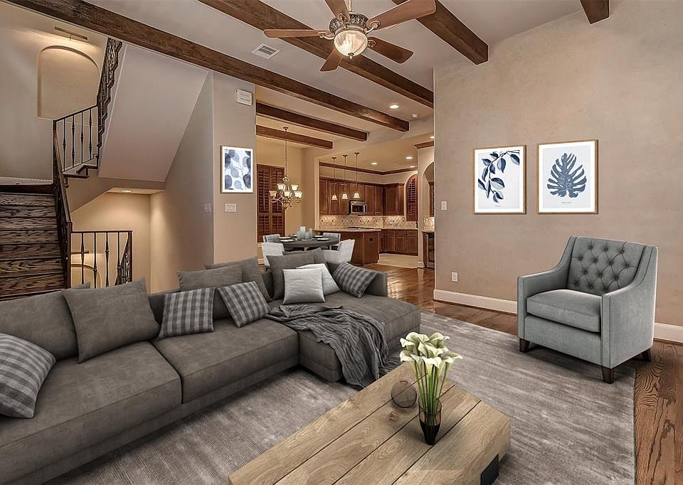 Second floor living! Gorgeous beams and open floor plan into the dining and kitchen! Virtual Staging