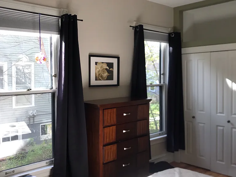 master bedroom with two closets, one spacious walk in closet