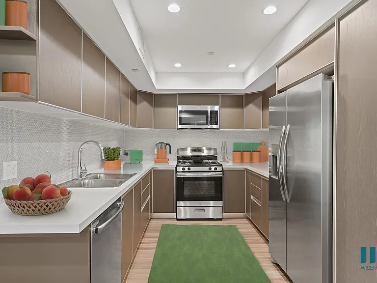 Full-Size Kitchen with Stainless-Steel Appliances and Ample Cabinet Storage