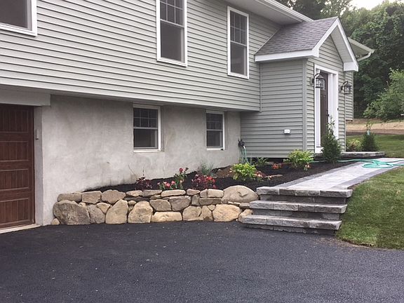Paver walkway and stone wall