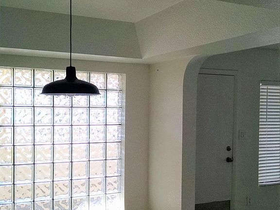 From breakfast bar, open to dining.