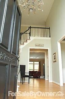 Beautiful Two-Story Entry
						:
						Opens to living room and formal dining room