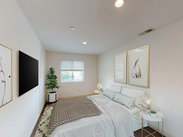 Bedroom 6. This image shows a virtually furnished space. Bedrooms come unfurnished.