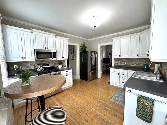 Kitchen with all new stainless steel appliances.
