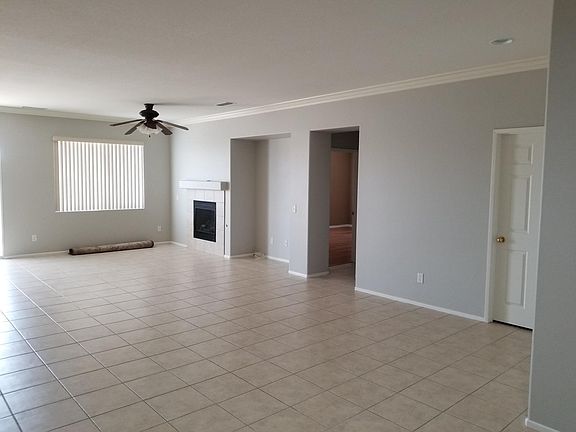 Great room with foyer entrance to master bedroom