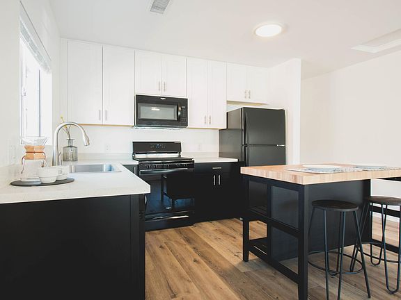 Move in with a kitchen island or a 6 person dining table for perfect entertaining!