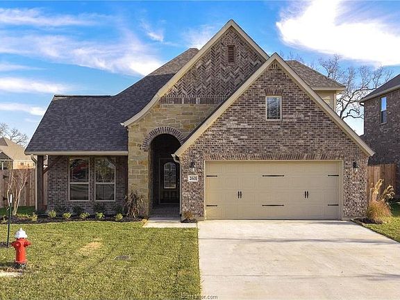 Front door, the front patio is much bigger than it looked here, and you can put a table there.