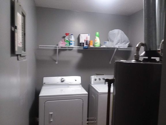 INCLUDES WASHER AND DRY in a nice size laundry room