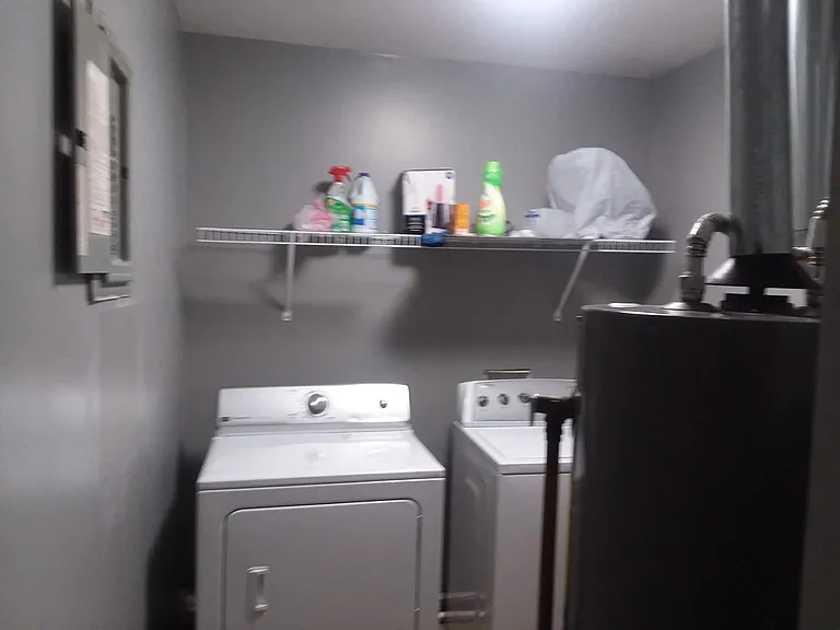 INCLUDES WASHER AND DRY in a nice size laundry room
