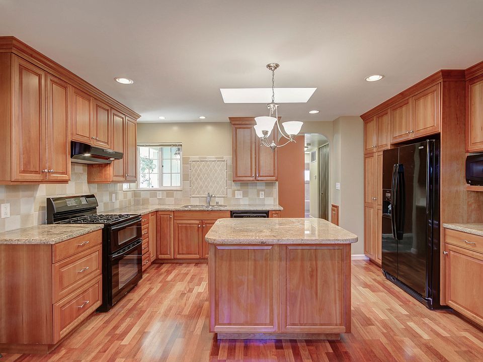 Recently upgraded open kitchen with skylight