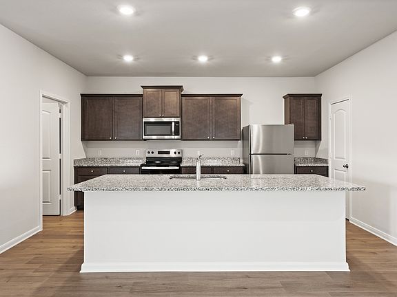 The kitchen has a convenient kitchen island.