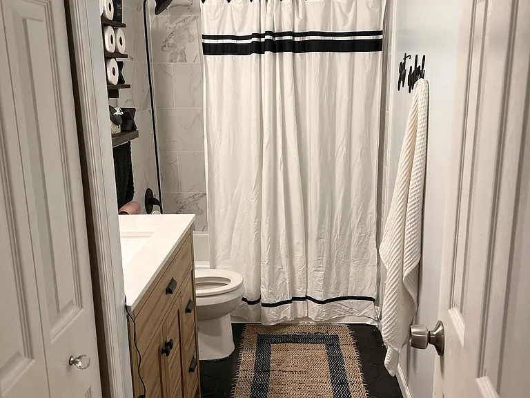 Full bathroom with tub