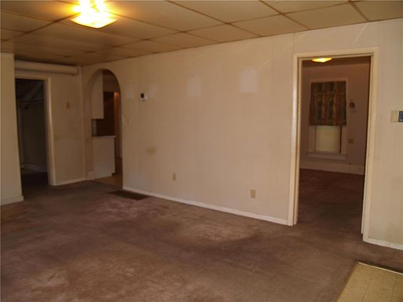 Bedroom first Door on Right, Kitchen through Archway.