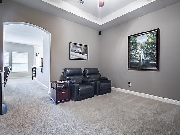Flex room with easy access to entryway into other living areas of the home can be utilized as a form