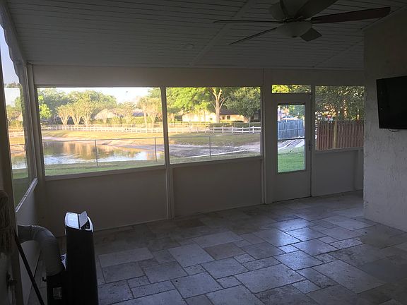 Enclosed Patio overlooking a lake