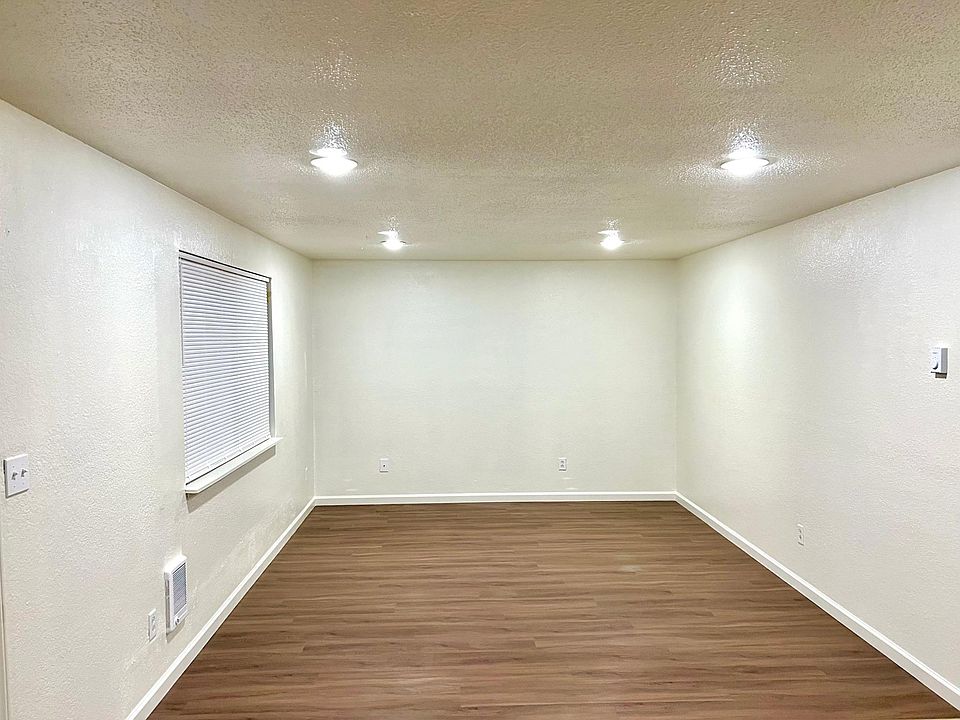 Large open space living room with Luxury Vinyl flooring