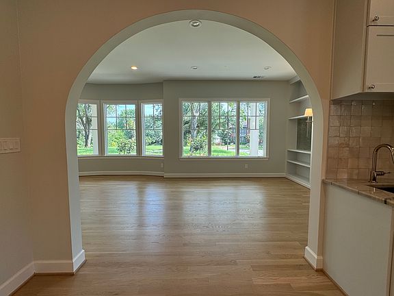 Formal living/dining room overlooks the wide front porch.