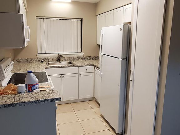 Kitchen. All new cabinets, new counters, new light fixtures, new fridge. Smooth top stove. New built in microwave.