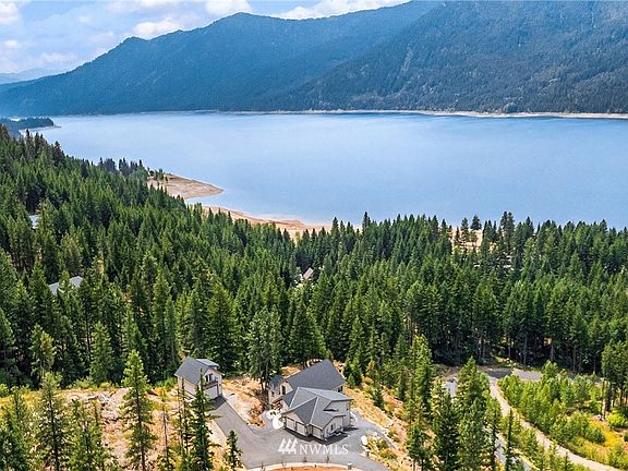 Luxurious view home perched above Lake Cle Elum in the gated community of Timber Ridge.