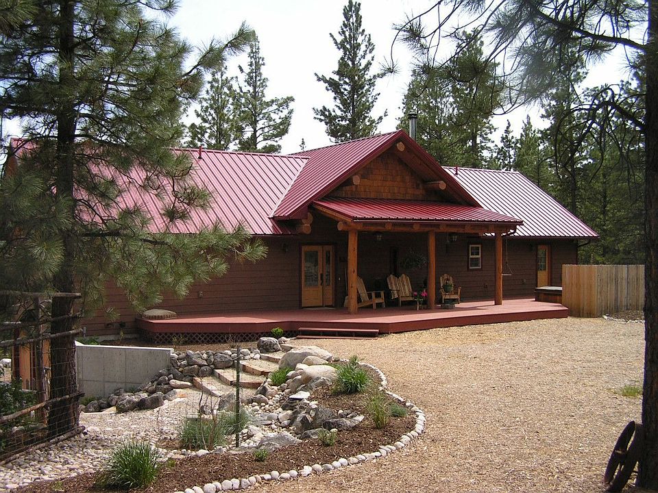 Front Entrance w/ covered decks & log accents
