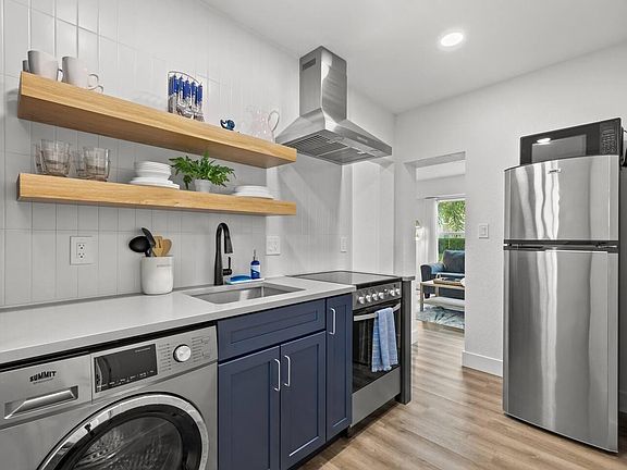 kitchen with entrance to living room