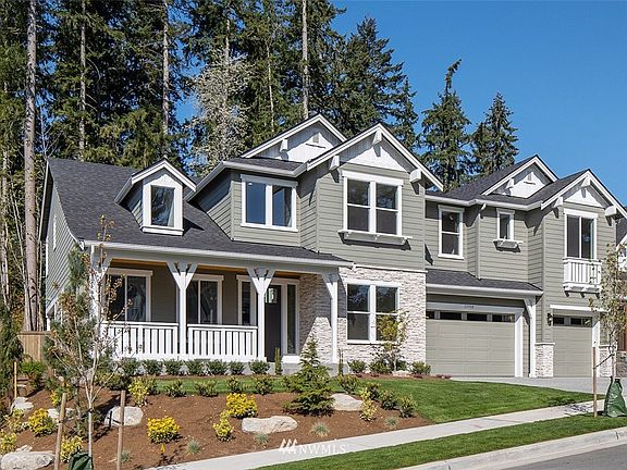 Tustin plan 4358 SF plan on lot 8 is Under Construction with an end of Dec completion.  Photos are of a different home with a left side garage ( from a different community), but with Different Elevation (A) .  Color, design, details and finishes are subject to change.