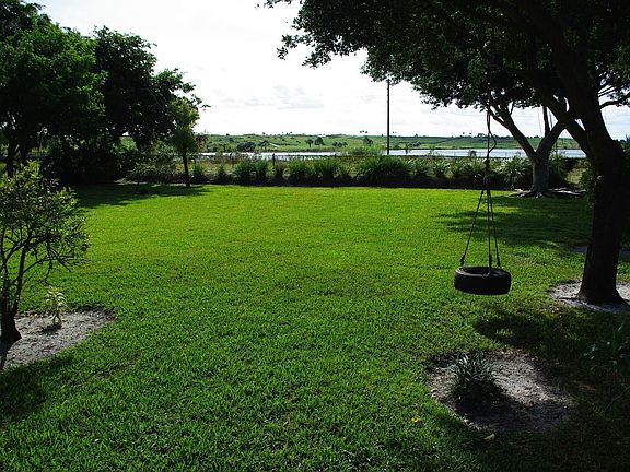Backyard view of Lake and Golf Course