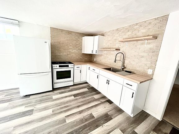 5th image of 2894 S Raleigh St