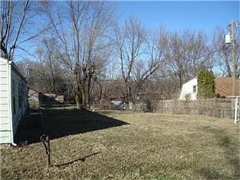 Large Yard for Gardening and Play
