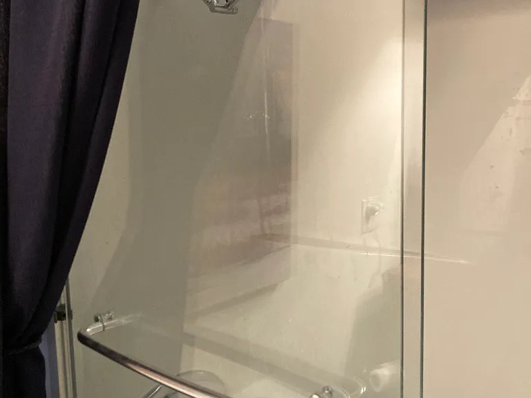 Hall bath shower/tub combo with rain shower head