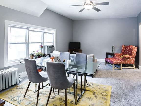 Spacious living/dining area has plenty of natural light.