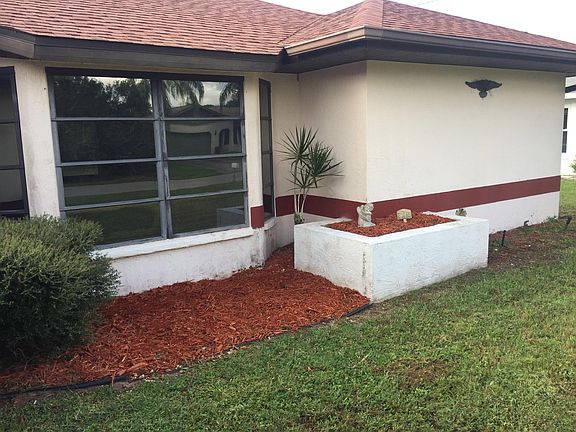 J & J Model Home . Raised Flower Beds.