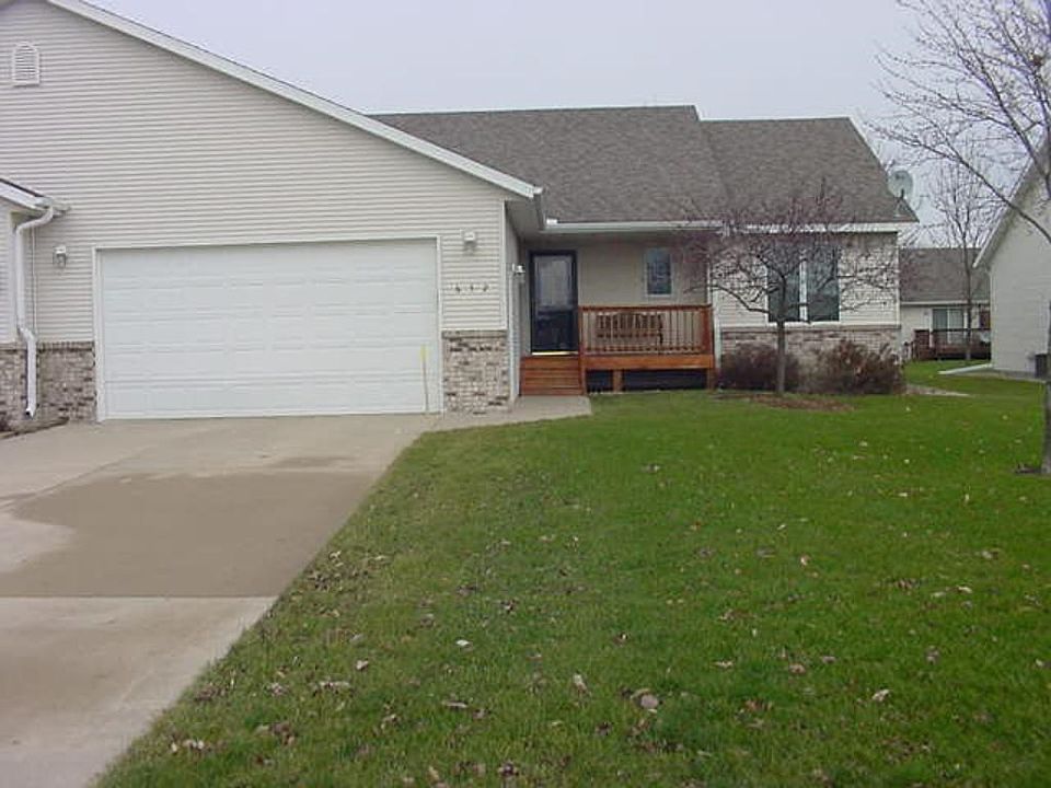 FRONT ELEVATION, CEMENT DRIVEWAY