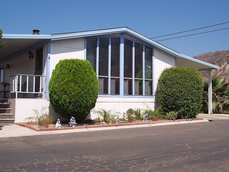 Nice end unit, large porch, low maint. yard