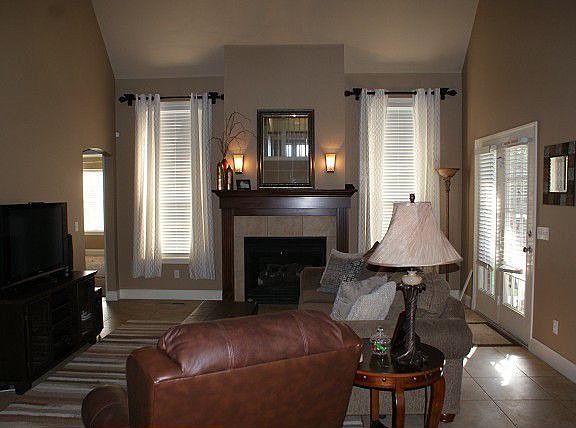 Fireplace in family room, access to patio.