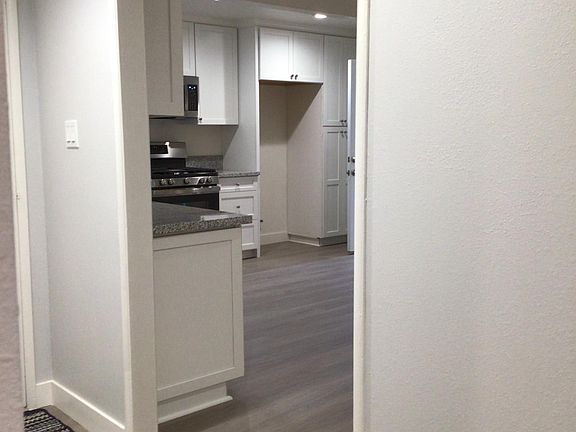 View from the front door entryway into kitchen