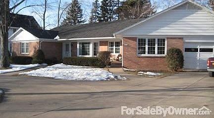 Front elevation
						:
						Beautiful custom built brick ranch with two wings