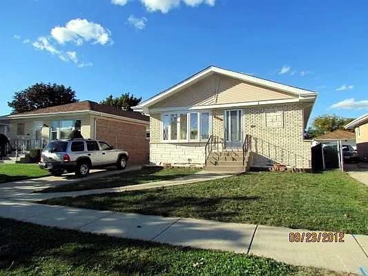 8684 W Ainslie St photo 1