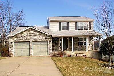 <font color="red" SIZE="+2"><marquee>THIS HOME SOLD FOR $194,500 IN 2009!</font SIZE="+2"></marquee></font color>Settled in a residential area but very close to downtown, this home includes a useable front porch and sidelights by the entry door. Laminate floors extend from the foyer through the kitchen, breakfast room and laundry.  Formal Living and Dining Rooms are perfect for entertaining and offer a flexible room arrangement.  The kitchen includes all the appliances as well as the first floor laundry.  You'll enjoy the warmth of a woodburning fireplace in the sunken family room with vaulted ceiling and access to one of two decks. Moving upstairs are three bedrooms including the vaulted master suite with walk-in closet and private full bath. Finished lower level has 4th bedroom, full bath and a giant sized recreation room. Sliders lead to a large patio, second deck and hot tub area. Best of all, special financing is available through SIRVA mortgage!