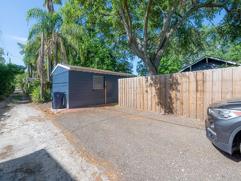 Convenient rear alley parking pad