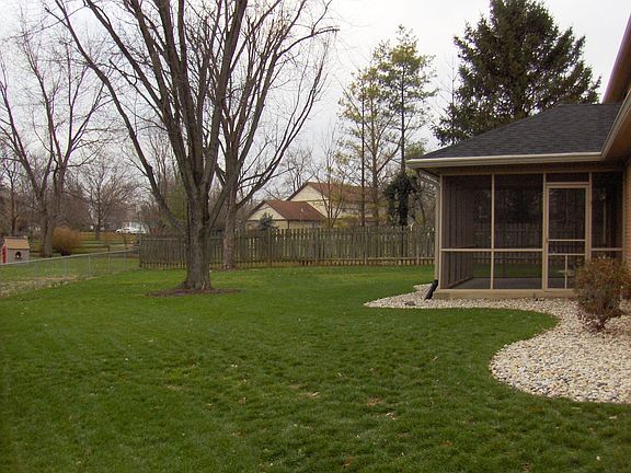 .35 ac. yard with large screened porch from which to enjoy the view.