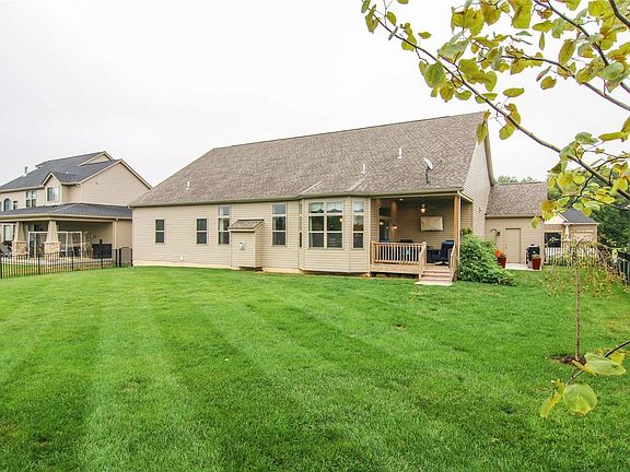 Backyard is enclosed with Black Aluminum Fencing . . .