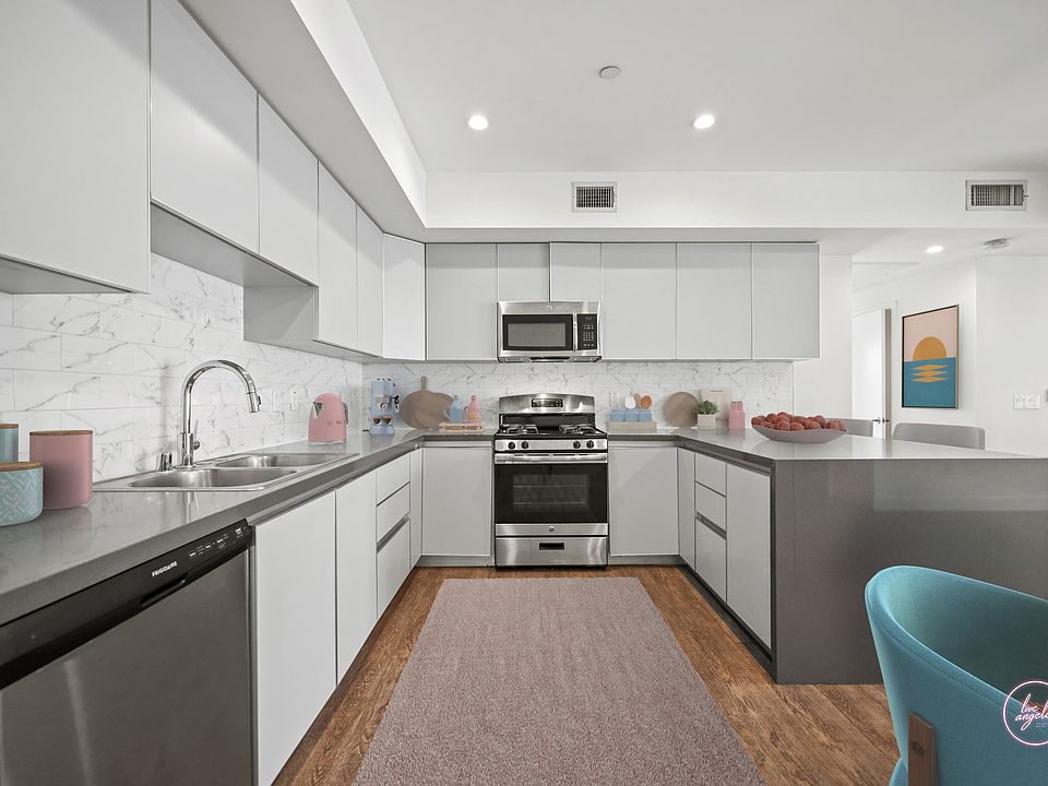 Large-Size Kitchen with Stainless -Steel Appliances and Plenty of Cabinet Space - Jayne Floor Plan at TE