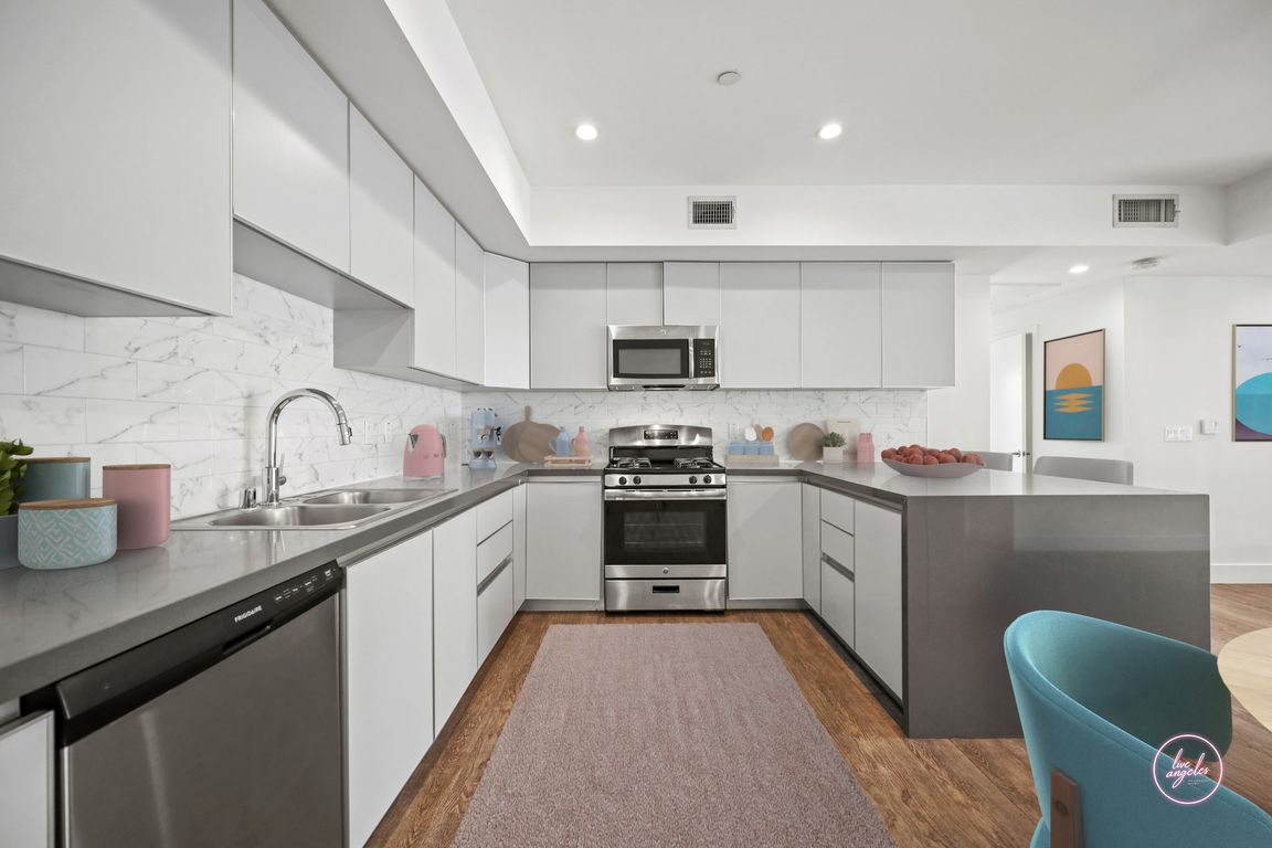 Large-Size Kitchen with Stainless -Steel Appliances and Plenty of Cabinet Space - Jayne Floor Plan at TE