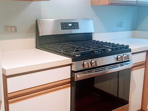 1st BUYER Bonus!! A brand new stainless steel range and hood!