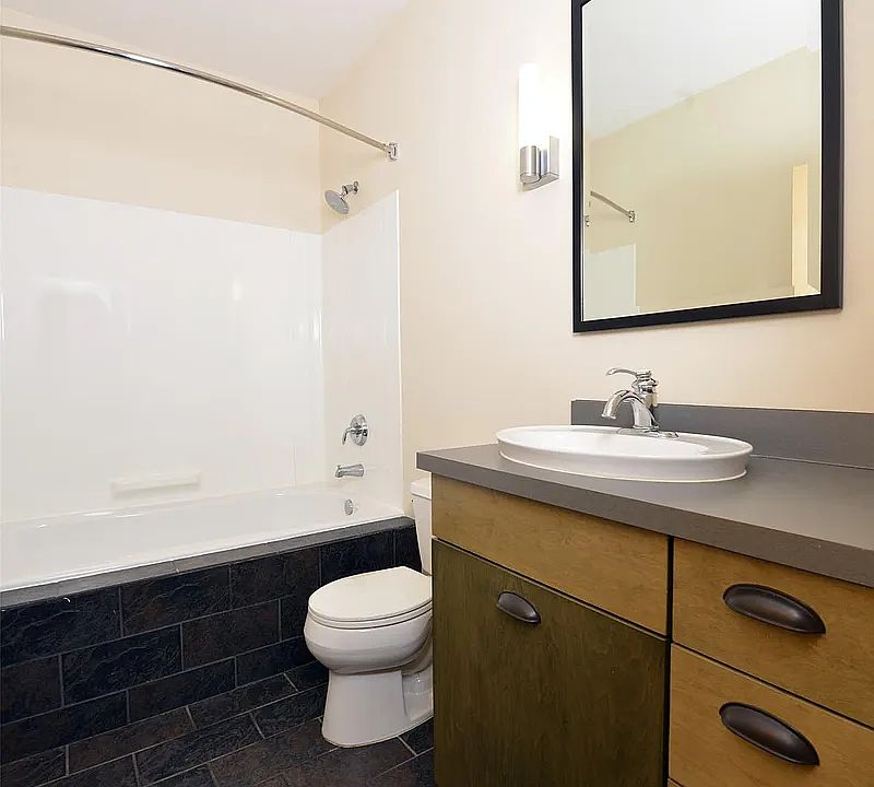 all baths have soaking tubs, slate floors
