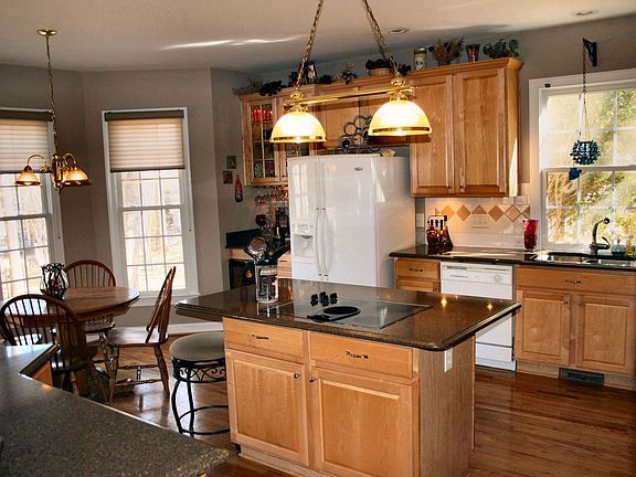 View of kitchen from den