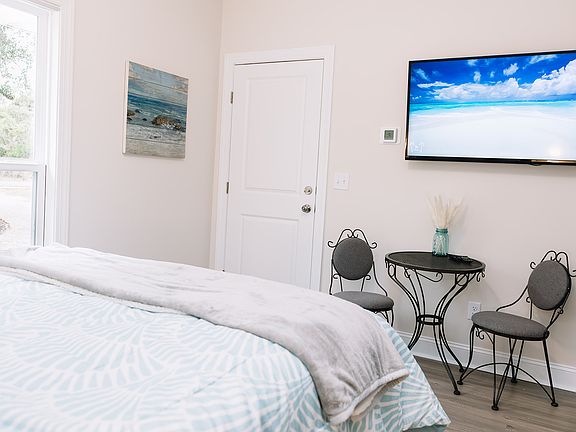 There are now blockout curtains and pull-down shades on the window. The door that goes to side A also has a curtain now. There's a double wall between sides for added privacy.