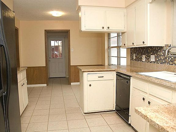 Wonderful updated  kitchen and breakfast room with an attached utility room.