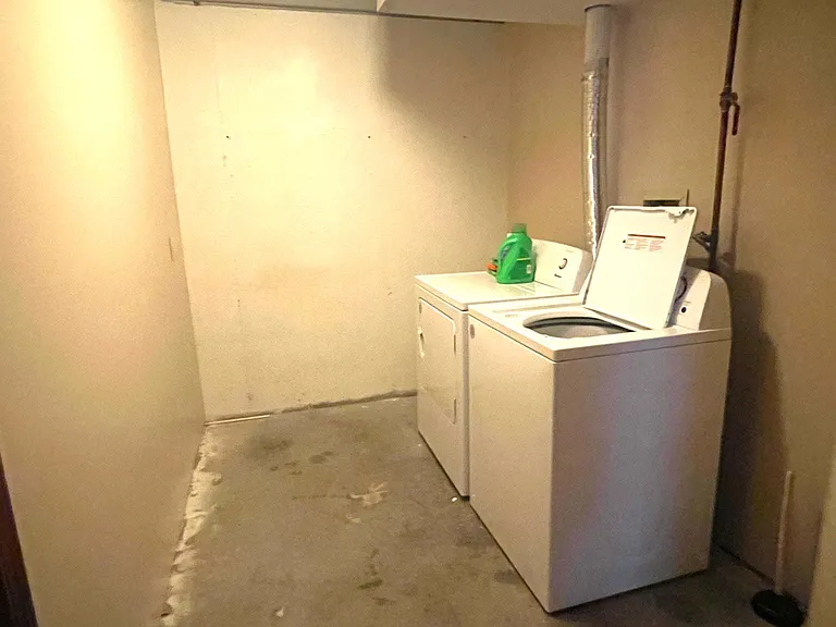 Indoor laundry downstairs off of the living room and 1 car garage